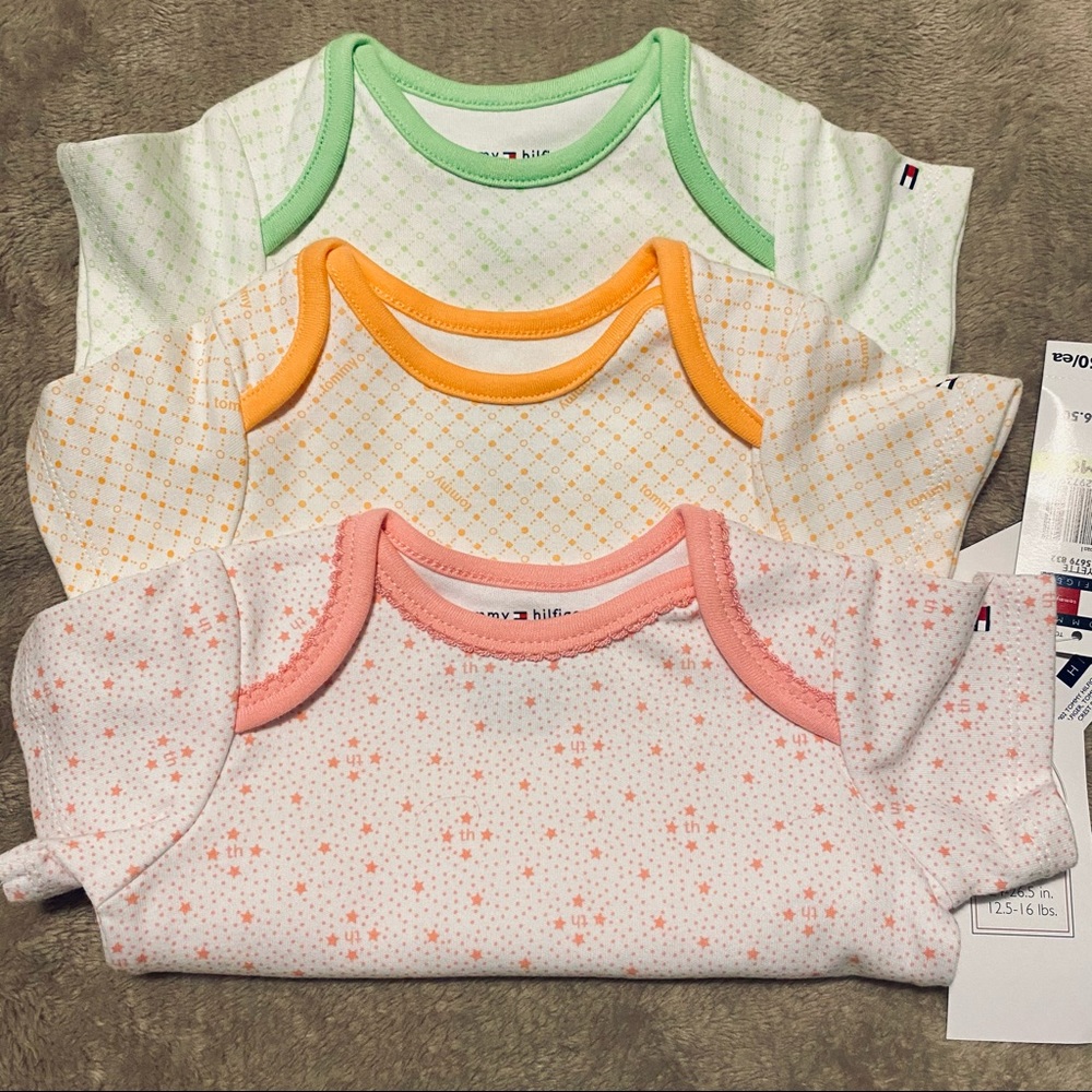 Set of three cute, comfy Tommy onesies.
